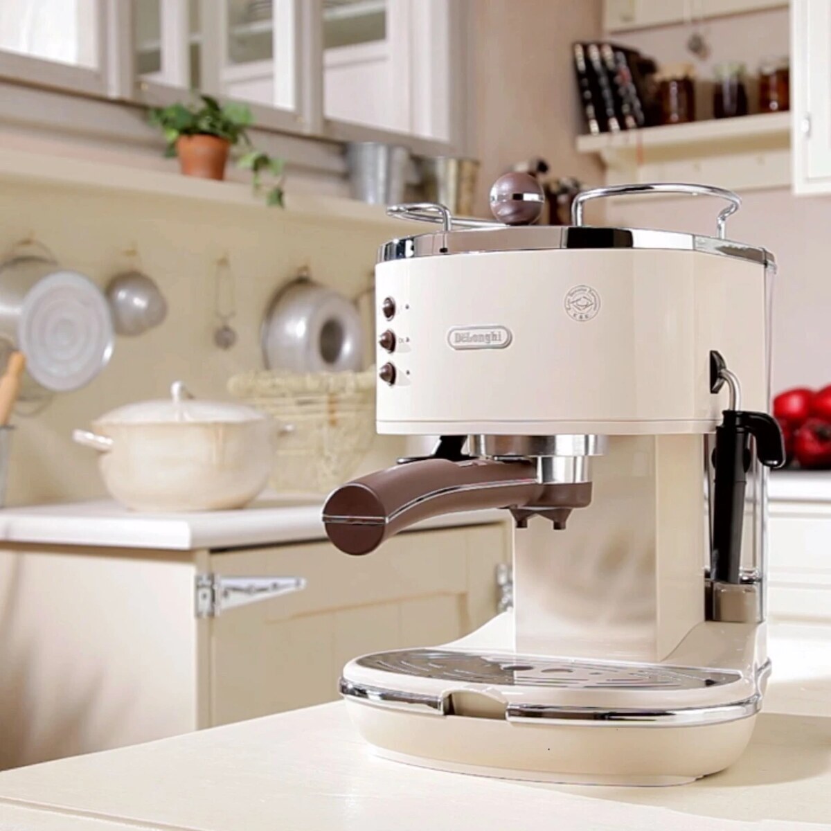 DeLonghi Icona Vintage pump espresso machine with a brown portafilter handle on a kitchen worktop